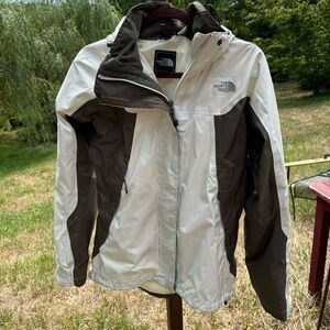 The North  Face Gore-Tex rain jacket size medium ideal outdoor layering piece.